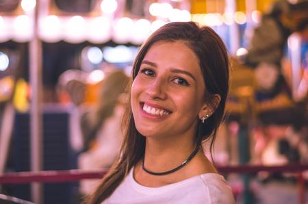 Close-Up Photography of a Woman Smiling