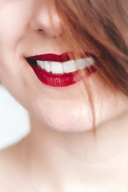 Close Up Photography of Woman With Red Lips