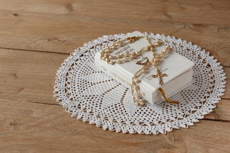 Close-up View of Bible And Rosary