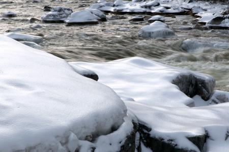 Closeup Photo Black Stone With Snows