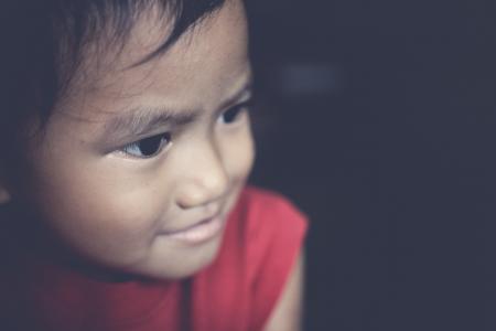 Closeup Photo of Toddler's Wearing Red Tank Top