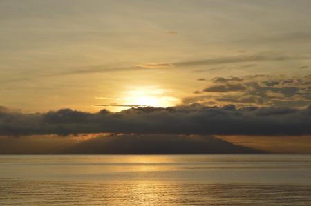 Clouds Above Calm Sea during Sunset