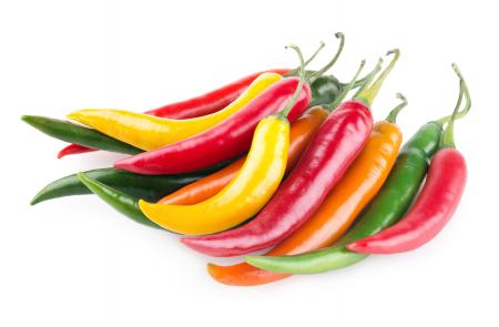 Colorful bell peppers isolated on white