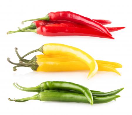 Colorful bell peppers isolated on white