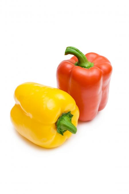 Colorful bell peppers isolated on white