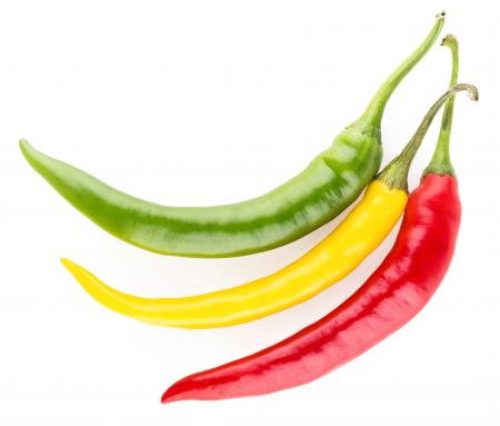 Colorful bell peppers isolated on white