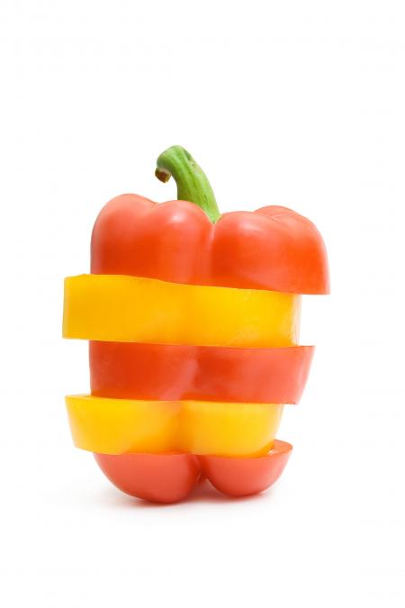 Colorful bell peppers isolated on white