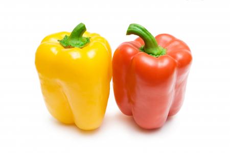 Colorful bell peppers isolated on white