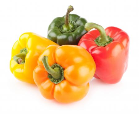 Colorful bell peppers isolated on white