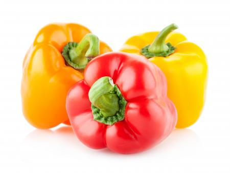 Colorful bell peppers isolated on white