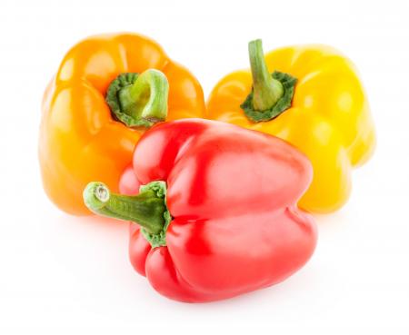 Colorful bell peppers isolated on white
