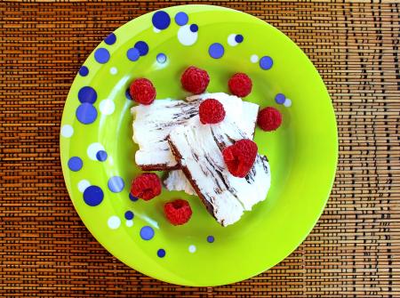 Colorful plate with icecream and fruit