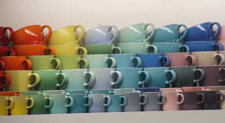 Colourful cups in the showcase