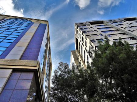 Concrete Building Photo Under Cloudy Sky