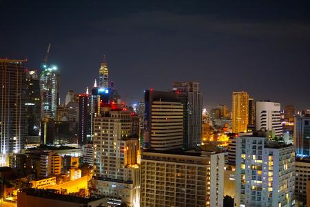 Concrete High Rise Building during Night Time