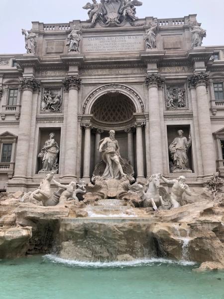 Concrete Structure With Group of People Statues