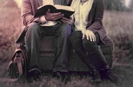 Couple in Love Reading Outdoors - Washed-out Effect