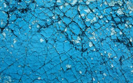 Cracked blue wall