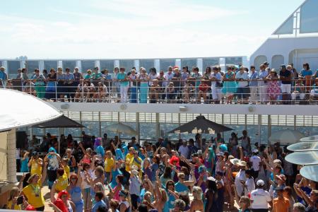 Crowd on the ship deck under the sun