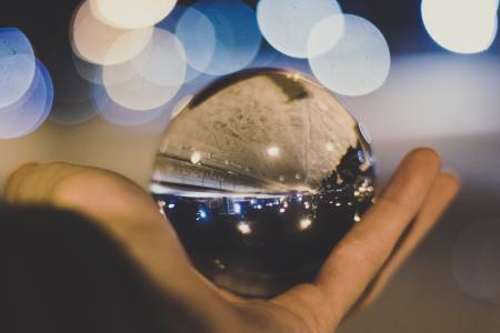 Crystal Ball on Person's Hand