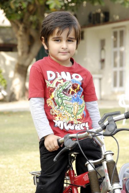 Cute Child with Bicycle