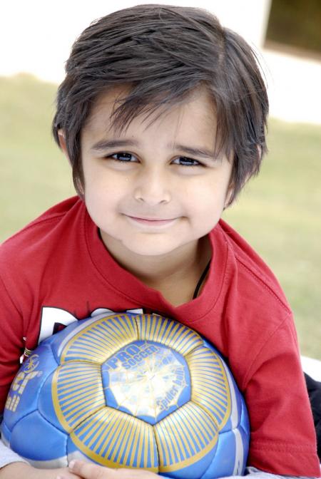 Cute Child With Football