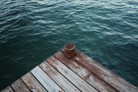 Dark Green Sea Water Wooden Pier