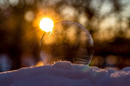 Defocused Image of Sun Reflecting in Water