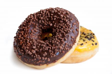 Delicious donuts isolated on white