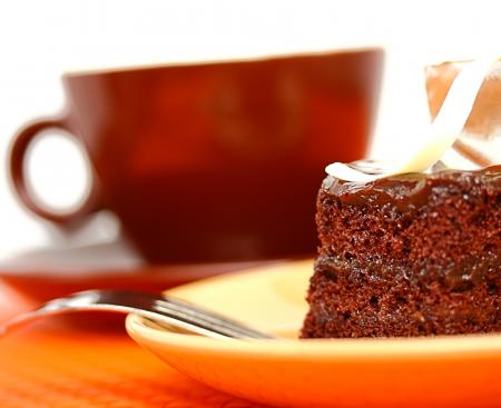 Delicious Piece Of Moist Chocolate Cake With Coffee