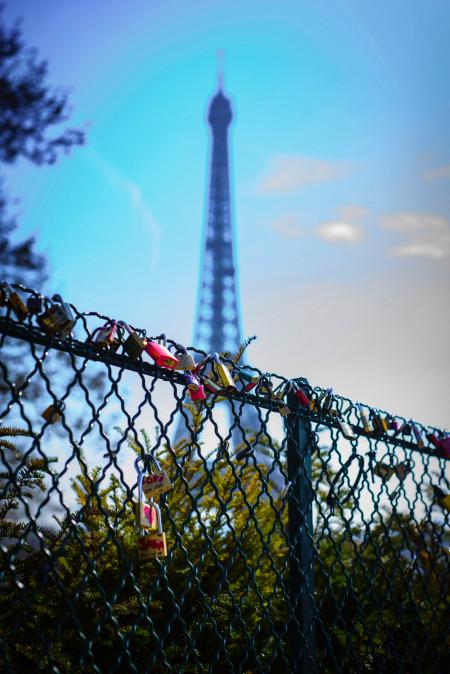 Depth of Field Photography of Love Keys on Chain Link Fence in Front of Eiffel Tower