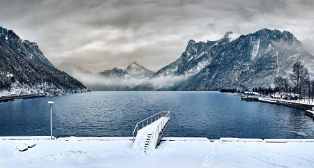 Dock Covered With Snow Near Lake