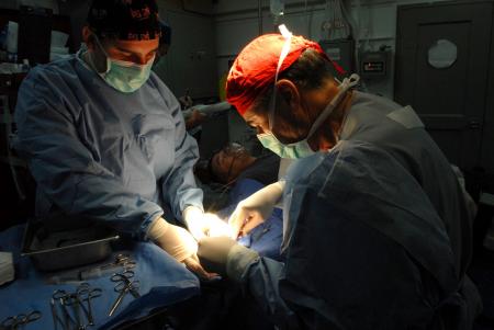 Doctors Performing Surgery