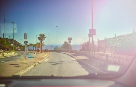 Driving along an ocean road