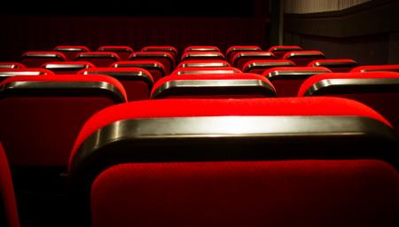 Empty movie theater with red seats cinem