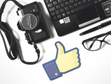 Facebook Thumbs-Up with Laptop and Camera