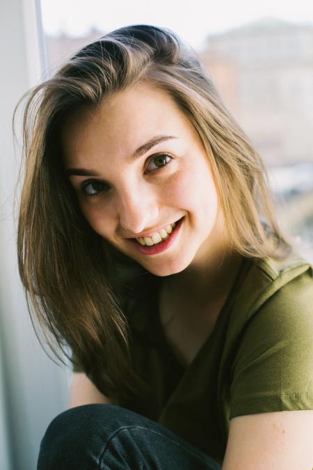 Female Wearing Green Top