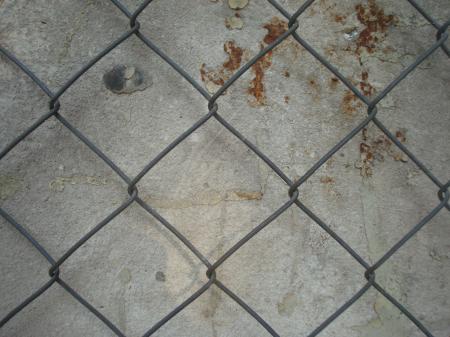 Fenced concrete wall texture