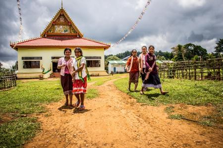 Five Women Walking on Green Grasses