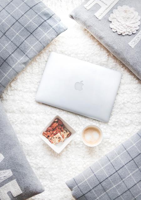 Flatlay Photography of Macbook and Snacks