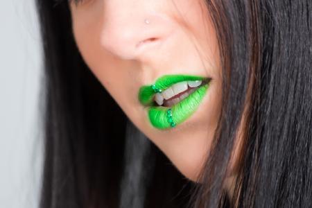 Focus Photography of Woman Wearing Green Lipstick