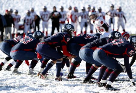 Football Team on Ice during Daytime