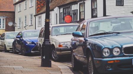 Four Car Parked Beside the Road