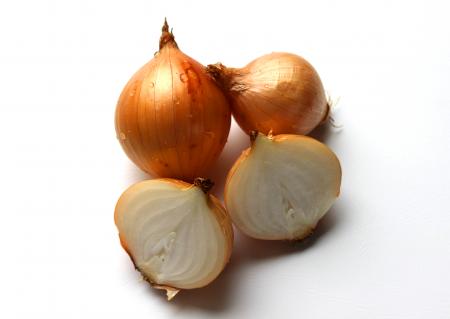 Fresh onion bulbs isolated on white back
