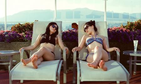 Friends Relaxing by the Pool