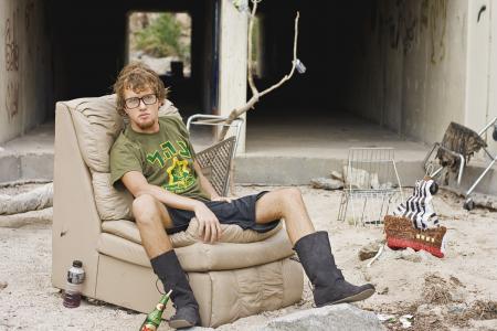 Full Length of Man Sitting Outdoors