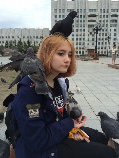 Girl and pigeon