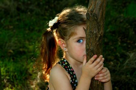 Girl Behind the Tree