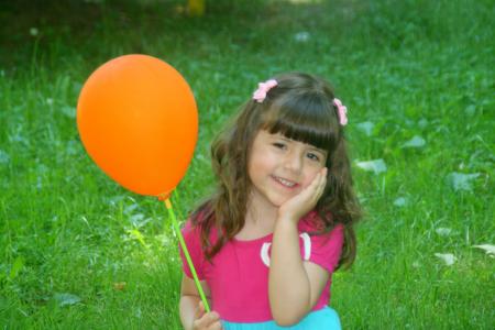 Girl holding a Balloon