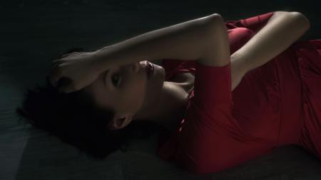 Girl in Red Lying